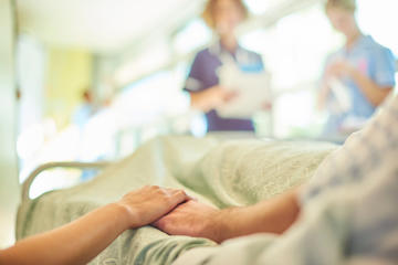 Patients Holding Hands