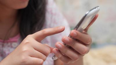 Person Using Mobile Phone