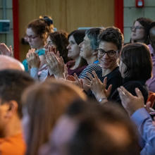 Event attendees clapping